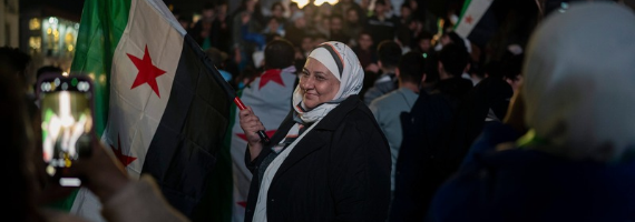 dpa_Syria%20Celebrations%20Homs_Fall%20of%20Bachar.png